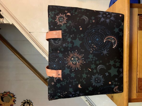 Celestial Bag on Outside with Strap Hidden